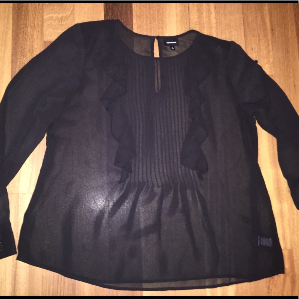 Sheer black blouse with ruffles